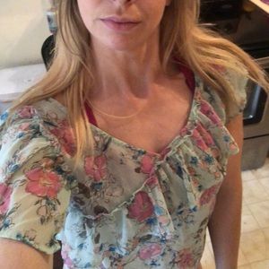 Frilly summery work top.